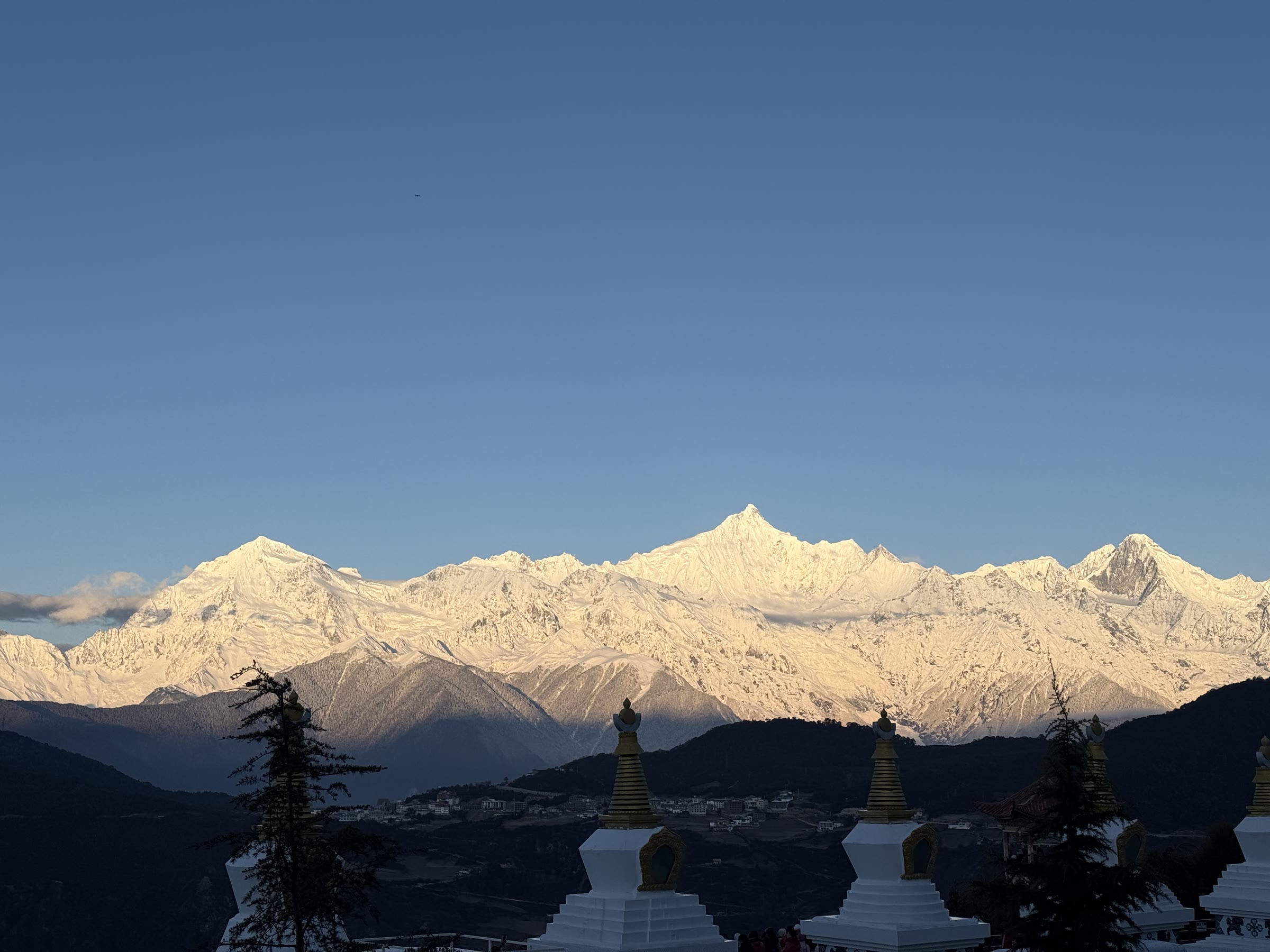 Meili Snow Mountain peaks in morning light from Wunongding near Deqin, Yunnan